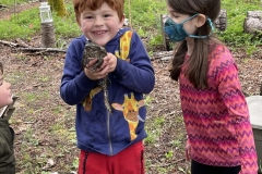Emmett is thrilled with the frog. Ruby too.
