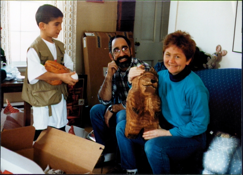 Jani poses with newly received bear sculpture