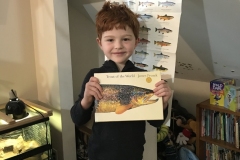 Emmett with James Prosek book and trout chart