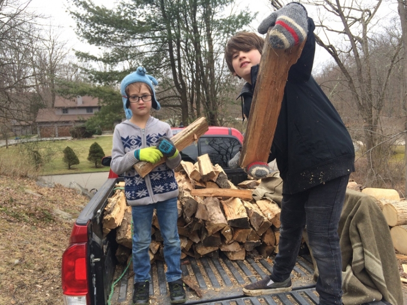 Unloading wood from Grandma Jani's truck