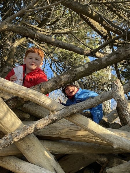 Emmett and Luca on the roof of their Pacific coast fort