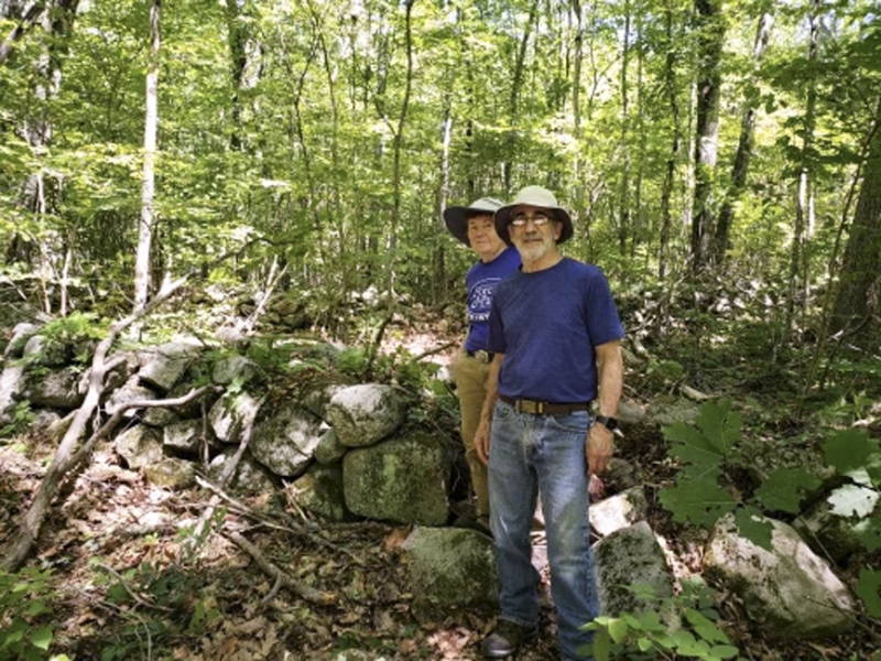 Moving the trailhead included modifying a stone wall