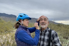 Removing cactus spines from errant mountain biker.