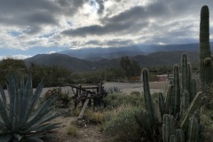 Rare rainstorm in the distance.