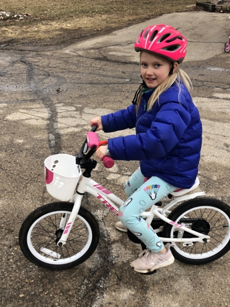 Aurora on her bike