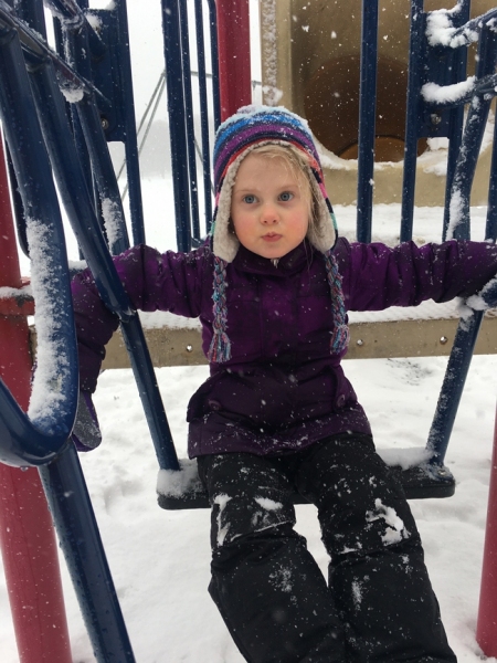 Maddie on a swing