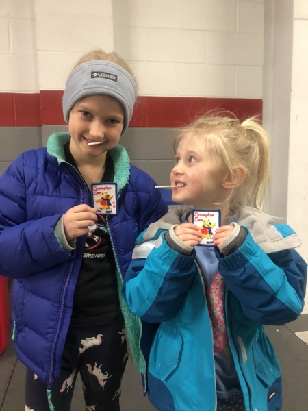 Girls with "Snowplow Sam" cards