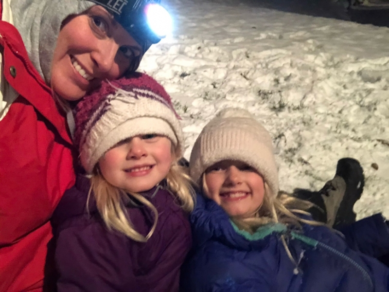 Nighttime sledding with mom