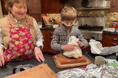 Jude places the ice cream on the cake that will make the baked alaska